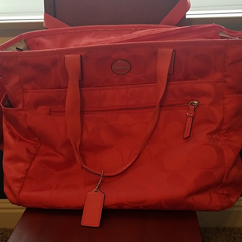 Orange coach diaper bag